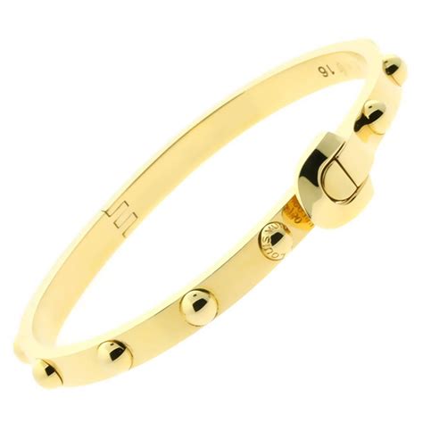 louis vuitton bracelet black and gold|Louis Vuitton gold bracelet women.